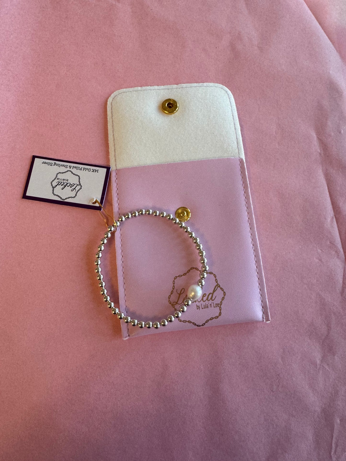 Silver with statement pearl