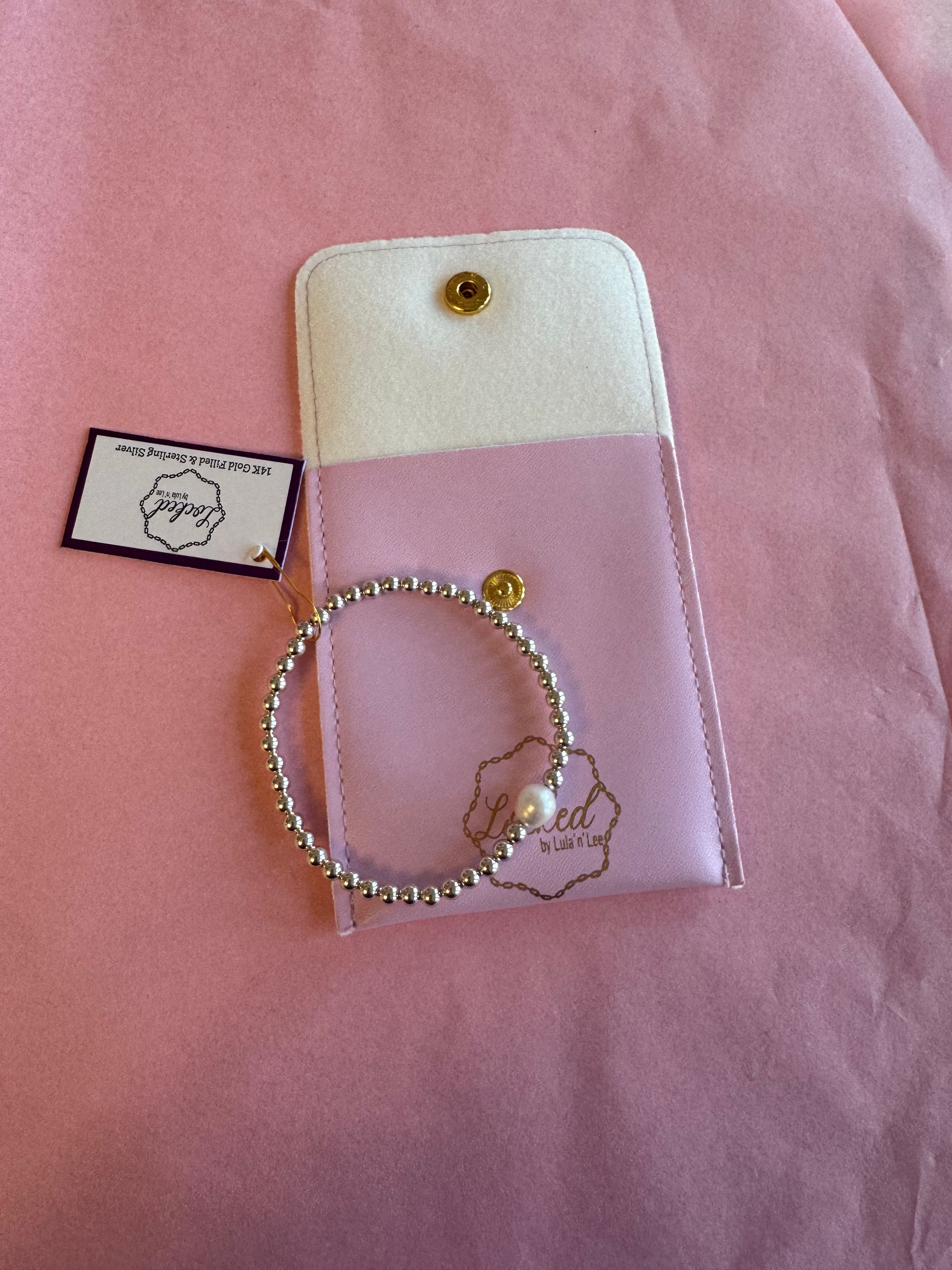 Silver with statement pearl