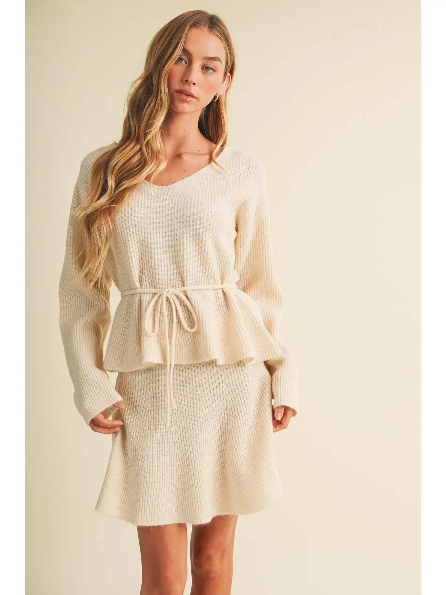 Cream Peplum Knit
